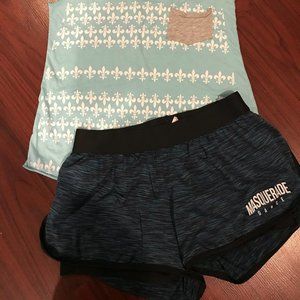 Light blue tank top with teal performance shorts